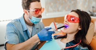 Smiling patient at Eva Dental